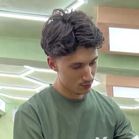 A Mustaqe barber at work